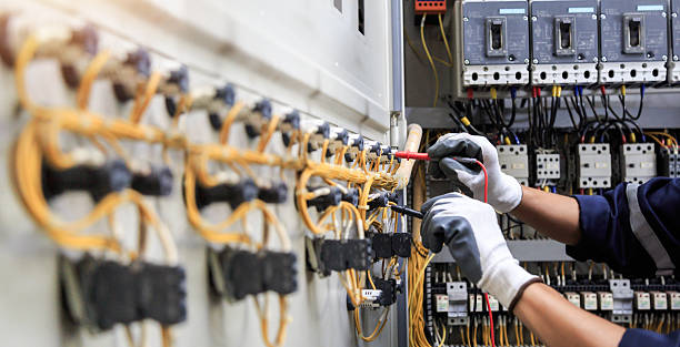 Professional Electrician technician working in Hampton Bays, NY